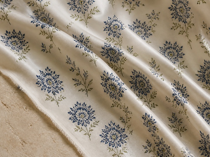 Cotton satin: fluid fall with colour reading deeper than on poplin.