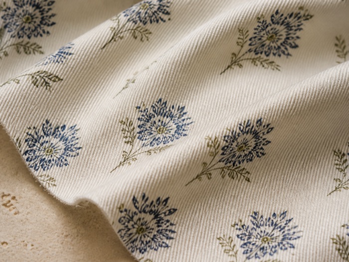 Cotton twill: diagonal structure with a rounder, softer fold.