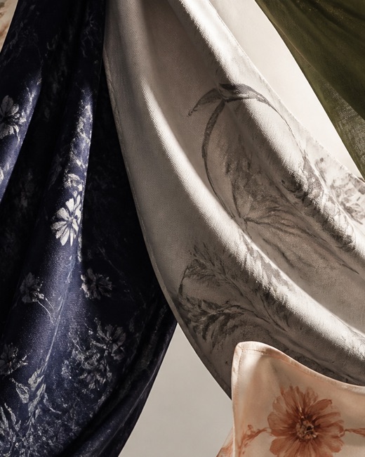 Draped printed satin and voile in ivory, navy and olive colourways.